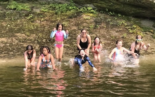 a group of people in the water