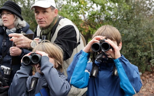 a group of people holding cameras