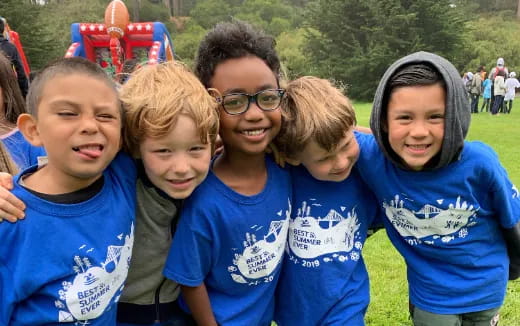 a group of children posing for a photo