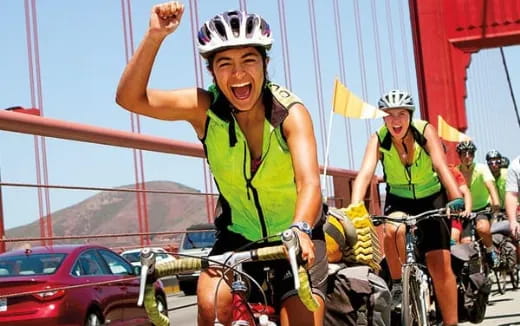 a group of people riding bikes