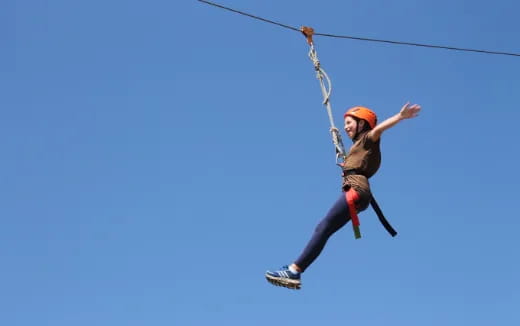 a person skydiving in the air