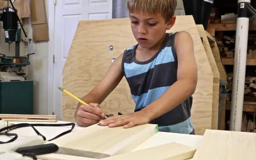 a young boy painting