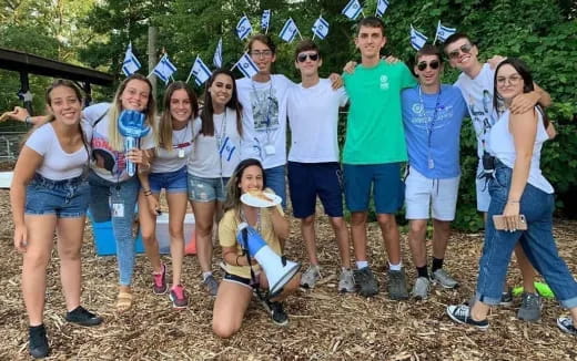 a group of people posing for a photo