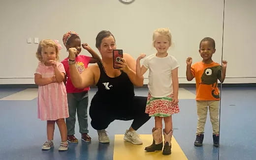 a group of children posing for a photo