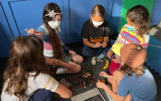 a group of people wearing masks