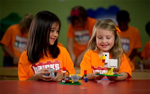 a few young girls playing a game