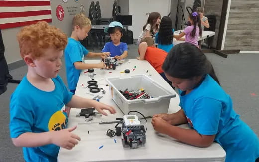 a group of kids playing with toys