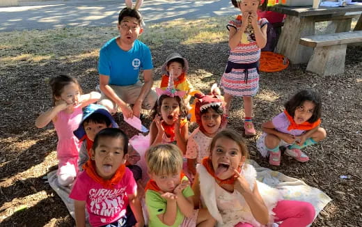 a group of children posing for a photo