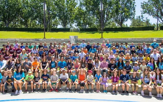 a group of people posing for a photo