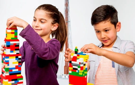 a person and a boy holding a gift box