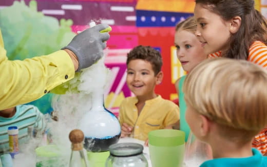 a group of children in a science lab