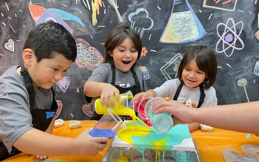 a group of kids playing with toys