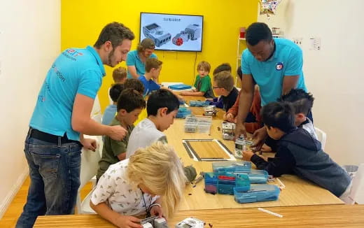 a group of children in a classroom