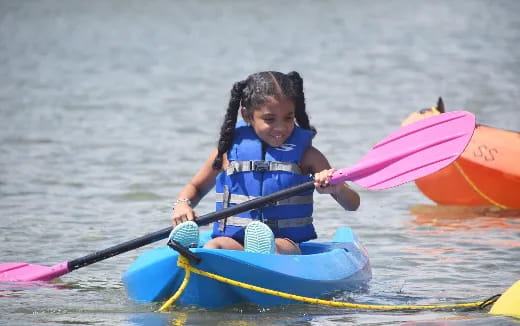 a girl in a kayak