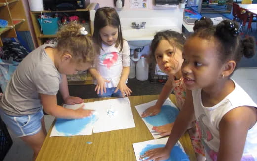 a group of children in a classroom