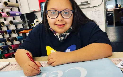 a person sitting at a table