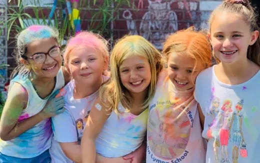 a group of girls smiling