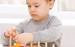 a young boy painting