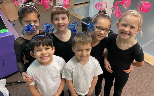 a group of children posing for a photo