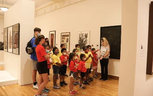 a group of children in a museum