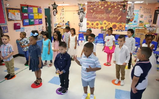 a group of children in a classroom