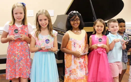 a group of girls posing for a photo