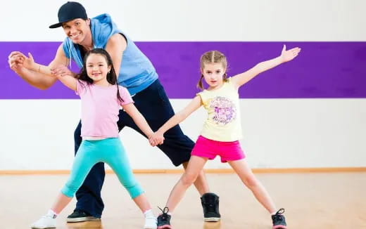 a person and a girl dancing