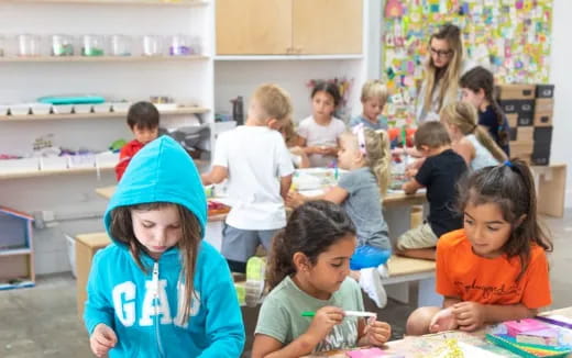 a group of children in a classroom