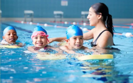 a group of people in a pool