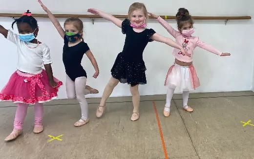 a group of girls wearing clothing