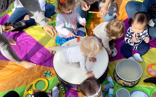 a group of children playing on the floor