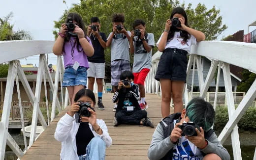 a group of people taking pictures