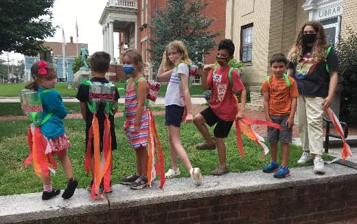 a group of children in clothing