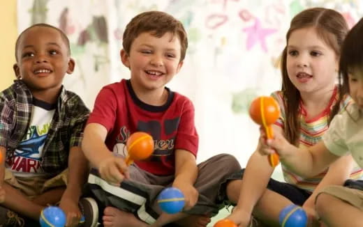 a group of children playing with toys