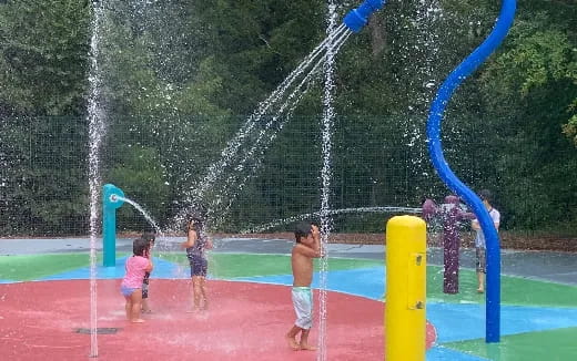 children playing in a water park