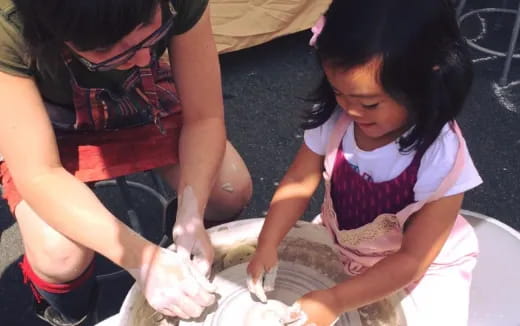 a person washing a child