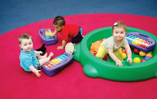 a group of kids playing in a ball pit