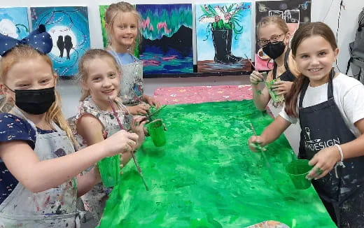 a group of children in a pool