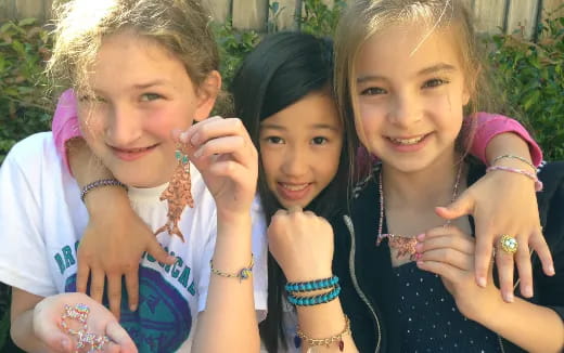 a group of girls posing for a photo