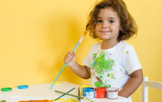 a young girl painting