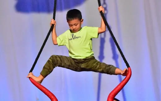 a boy on a swing