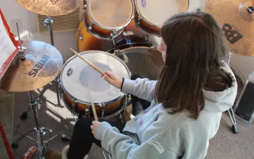 a person playing the drums