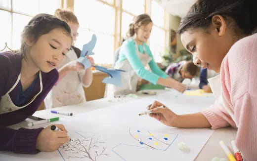 a group of children drawing