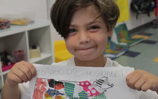 a child holding a book