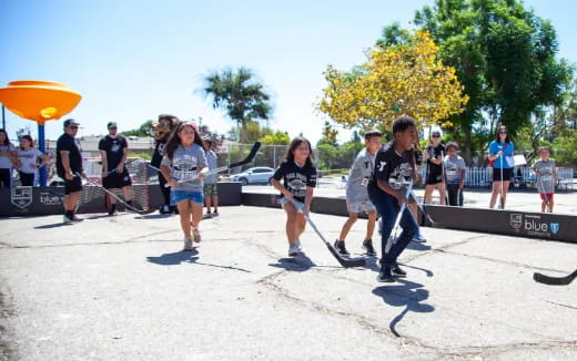 a group of people running on a street