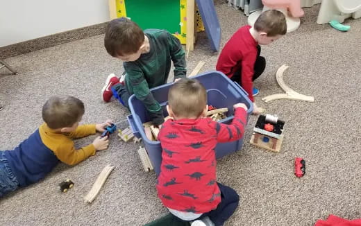 a group of kids playing with toys