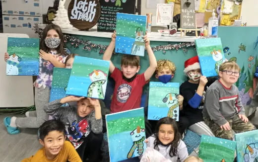 a group of children wearing masks