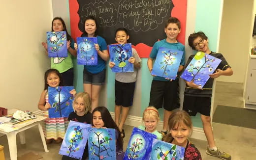 a group of children posing for a photo