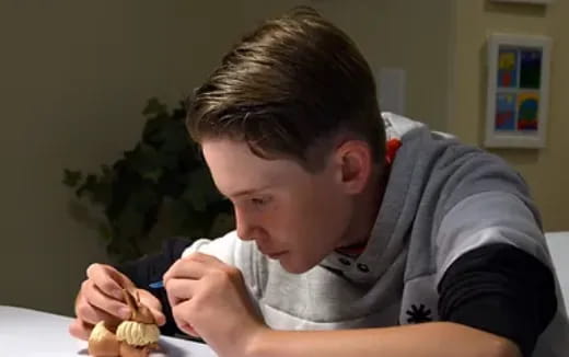 a boy eating a banana