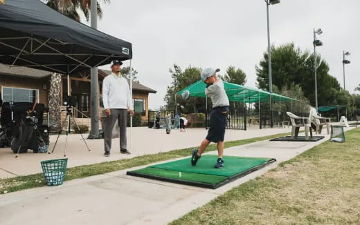 a person playing golf